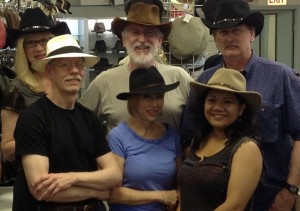 The Twangdogs, a local country and rock group who first met at the Old Town School of Music, get some new hats for their next gig.
